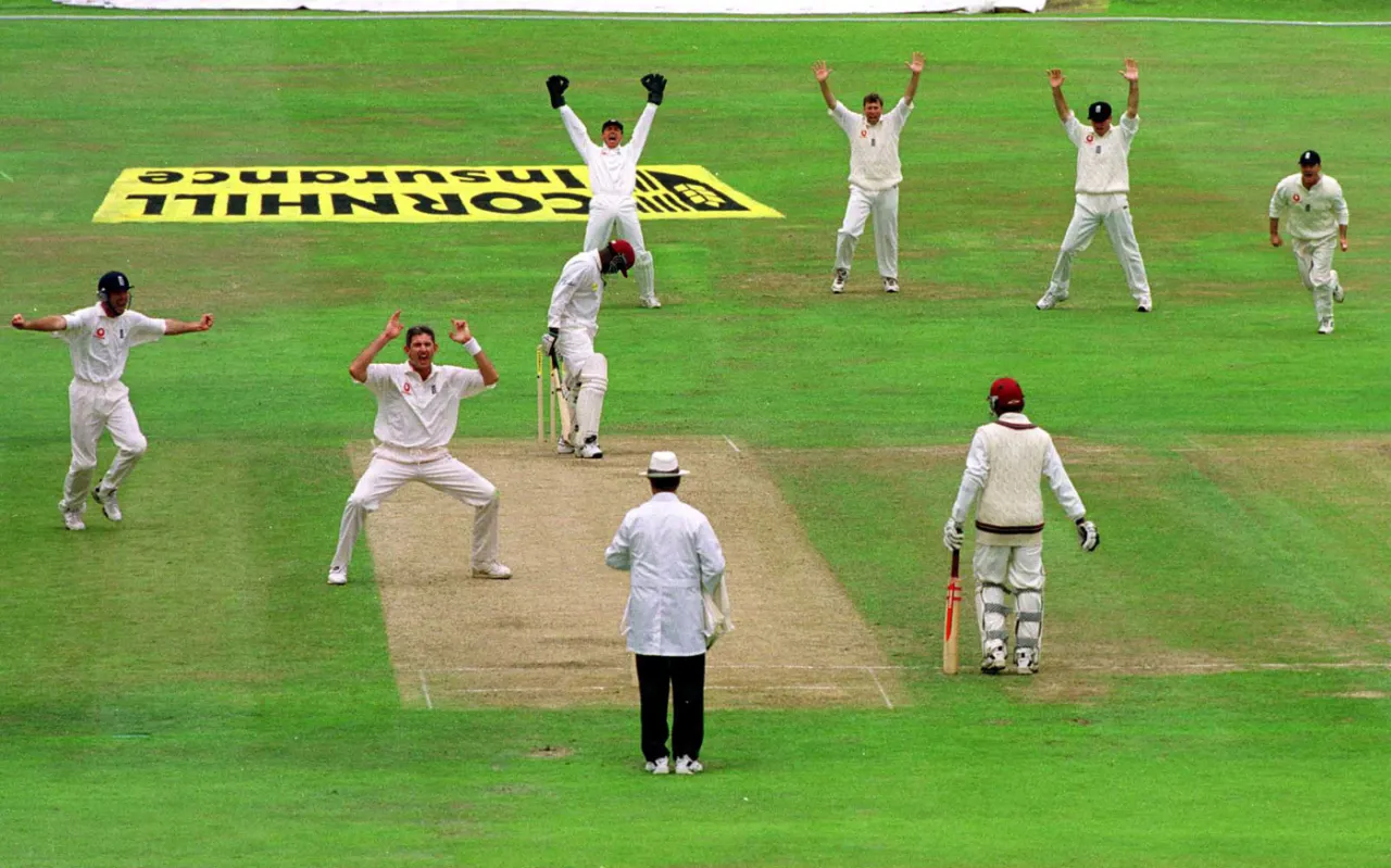 Andy Caddick took four wickets in an over as West Indies collapsed for 61